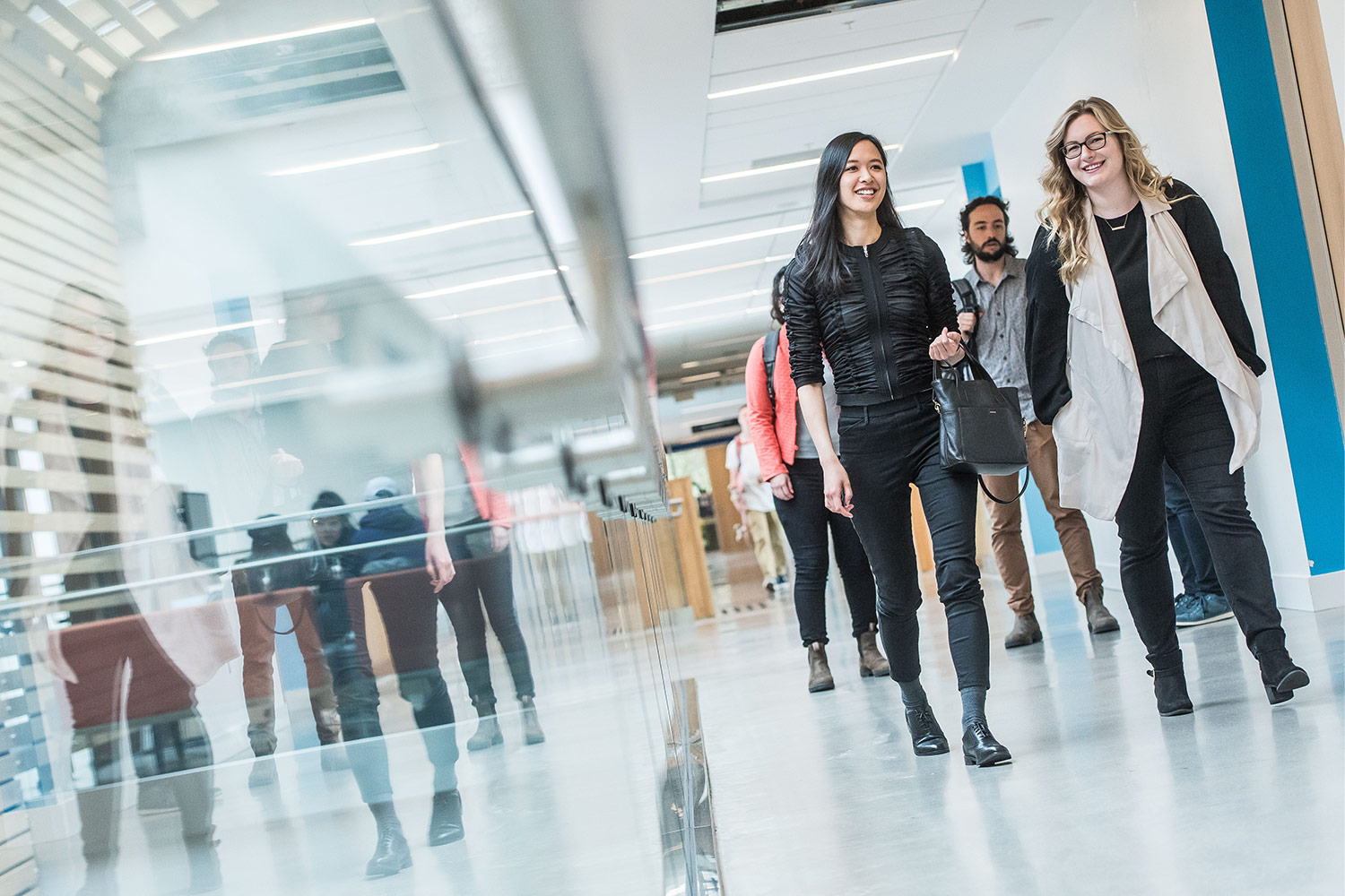 UBC GRSJ students walking in a hallway